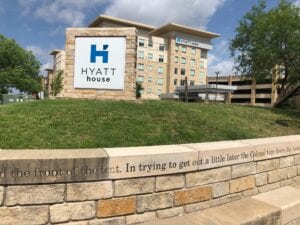 Hyatt house with brick walls and lawn